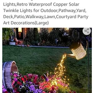 Solar watering can with twinkle lights